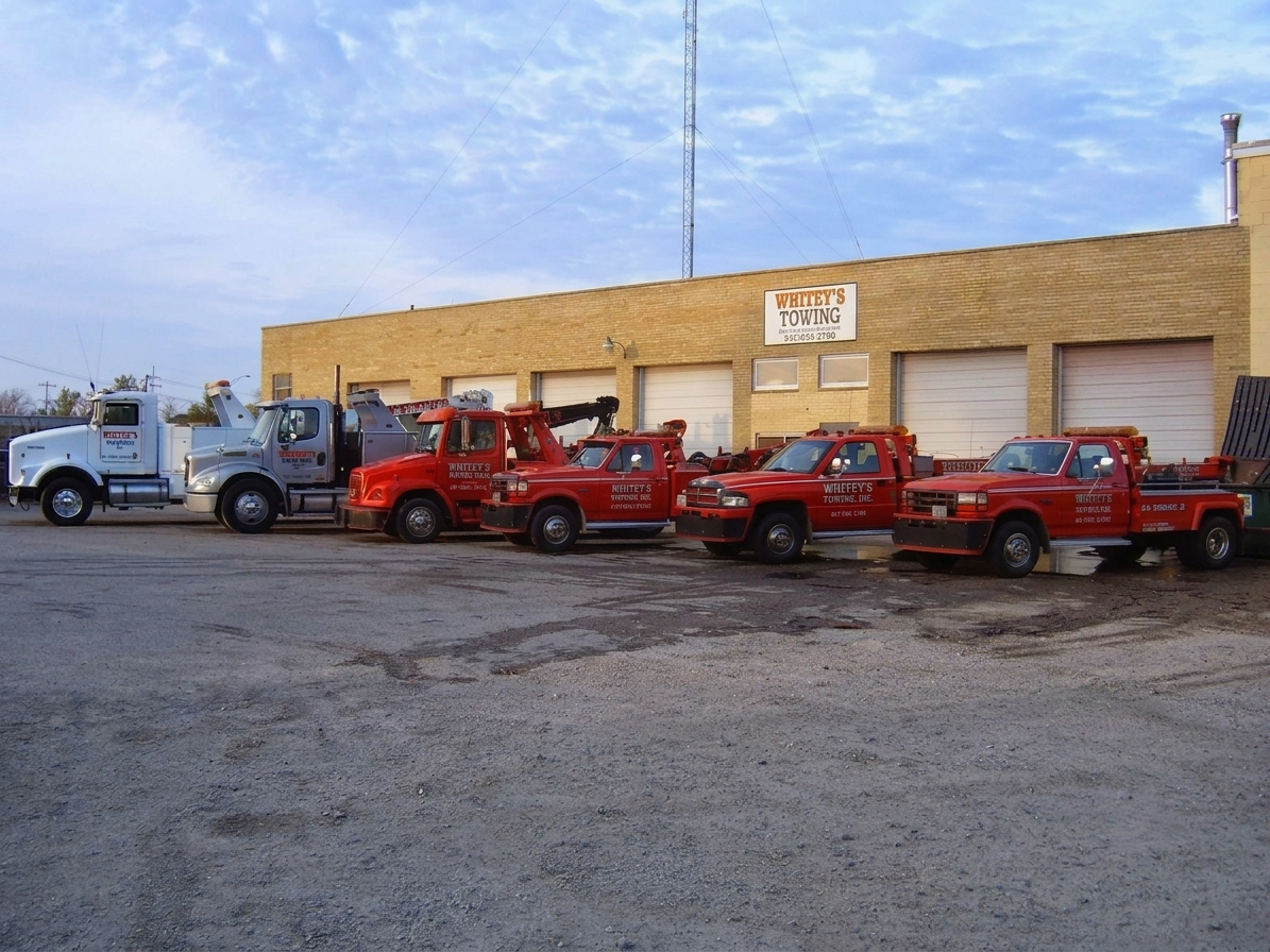 WHITEYS TOWING INC service image